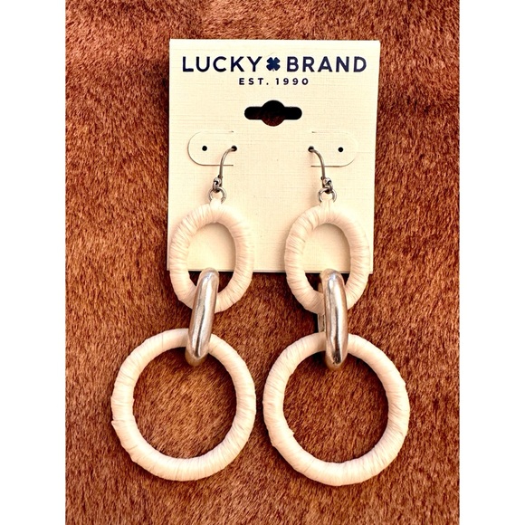 Lucky Brand Jewelry - Lucky Brand Raffia Dangle Hoop Earrings White and Silver.